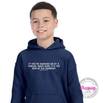 Navy hoodie featuring white hem of His garment scripture text