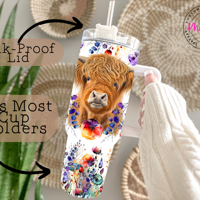 highland cow tumbler surrounded by flowers, 40oz capacity.