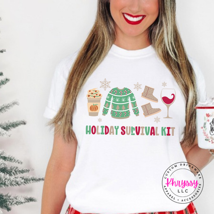 Flat lay of the Holiday Survival Kit Christmas tee in White.