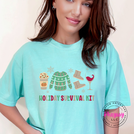 Model wearing the Holiday Survival Kit tee in Chalky Mint.