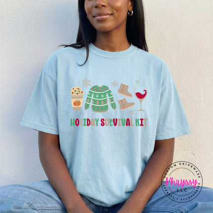 Close up of the Holiday Survival Kit art on a Chambray tee.