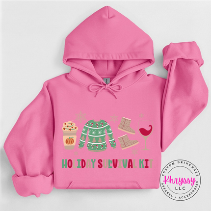 Model wearing the Holiday Survival Kit hoodie in Azalea.