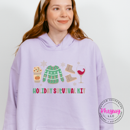 Model wearing the Holiday Survival Kit hoodie in Orchid.