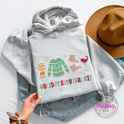 Holiday Survival Kit funny Christmas essentials hoodie in Ash heavyweight fleece