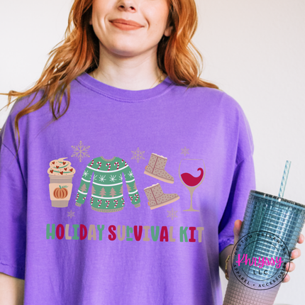Close up of the Holiday Survival Kit art on a Violet tee.
