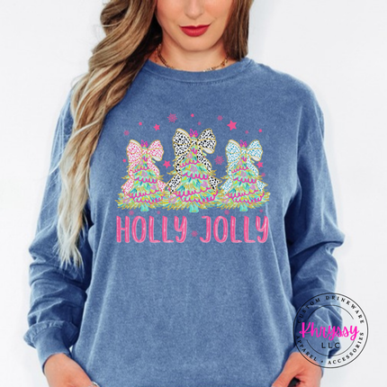 Model wearing the Holly Jolly bow tree long sleeve tee in Blue Jean.