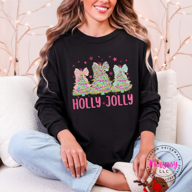 Black long sleeve tee featuring three bow topped Christmas trees and Holly Jolly lettering.