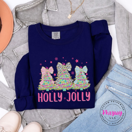 True Navy long sleeve tee showing glittery bow trees over pink Holly Jolly letters.