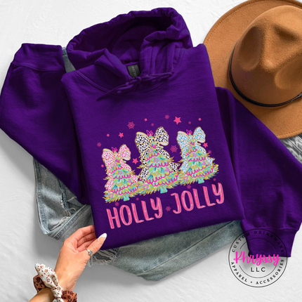 Model wearing the Holly Jolly bow tree hoodie in Purple.