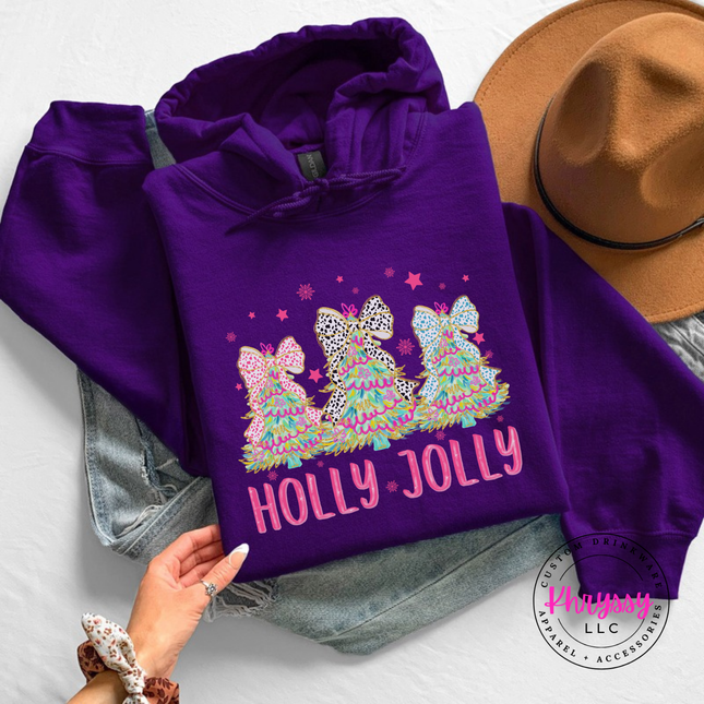 Model wearing the Holly Jolly bow tree hoodie in Purple.