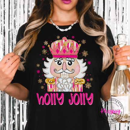 Black tee featuring a sparkly nutcracker and holly jolly lettering.