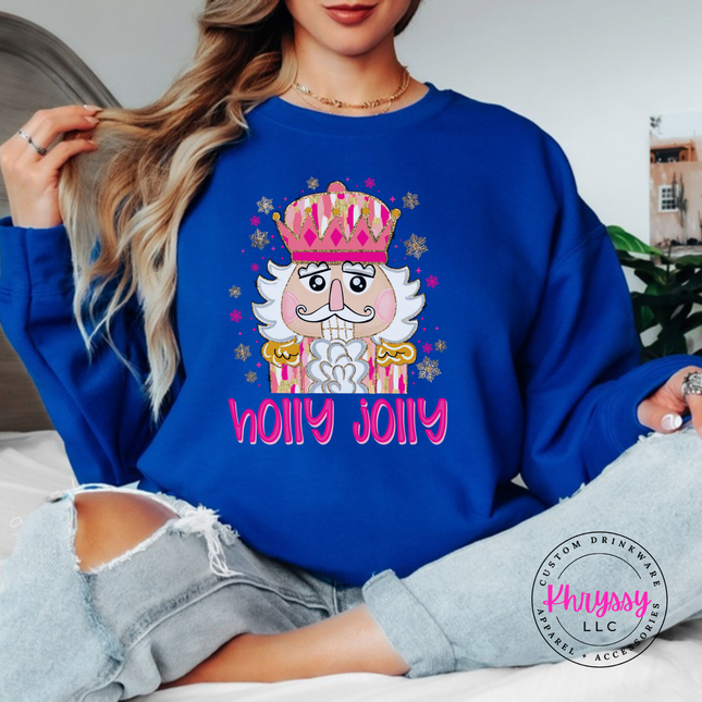 Flat lay of the Holly Jolly nutcracker Christmas crewneck sweatshirt in Royal.