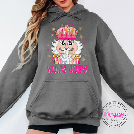 Model wearing the Holly Jolly nutcracker hoodie in Charcoal.