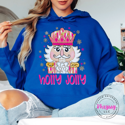 Flat lay of the Holly Jolly nutcracker Christmas hoodie in Royal.