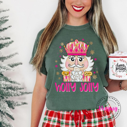 Model wearing the Holly Jolly nutcracker tee in Moss.