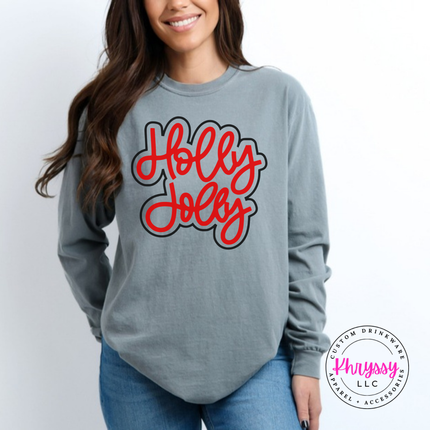 Grey long sleeve tee with Holly Jolly in bold outlined Christmas script lettering