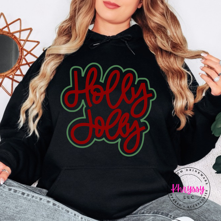 Black hoodie with Holly Jolly in bold outlined Christmas script lettering