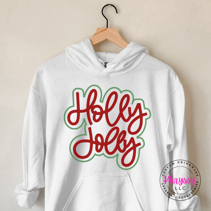 White hoodie with Holly Jolly in bold outlined Christmas script lettering