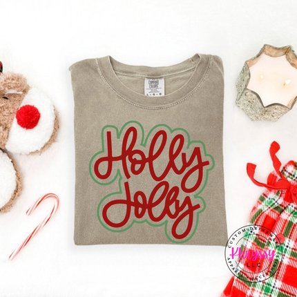 Sandstone tee with Holly Jolly in bold outlined Christmas script lettering