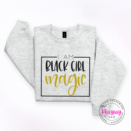 Ash grey sweatshirt showing bold Black Girl Magic empowerment lettering.