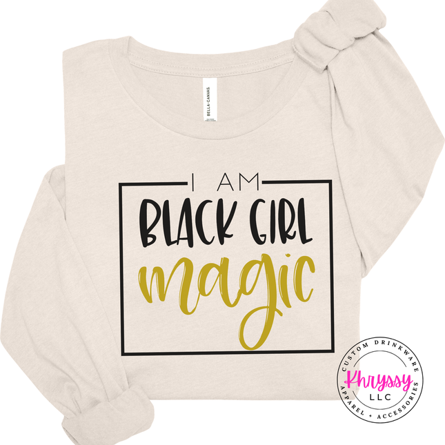 Natural shirt featuring black and gold Black Girl Magic lettering.