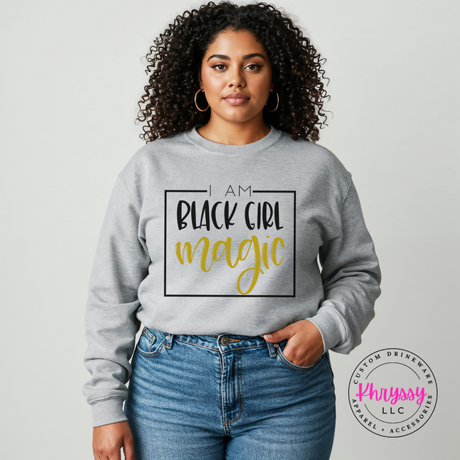 Sport grey crewneck with a black square frame and gold magic script.