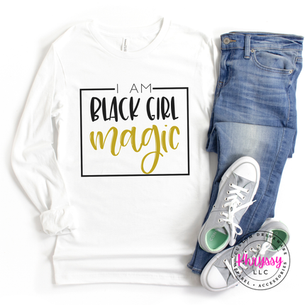 White Bella Canvas shirt with I Am Black Girl Magic in gold.