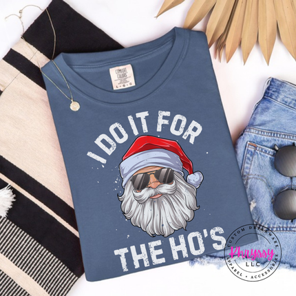 Denim long sleeve tee showing a funny Santa with distressed lettering.