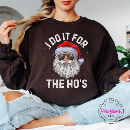 Close up of the funny sunglasses Santa art on a Dark Chocolate crewneck sweatshirt.