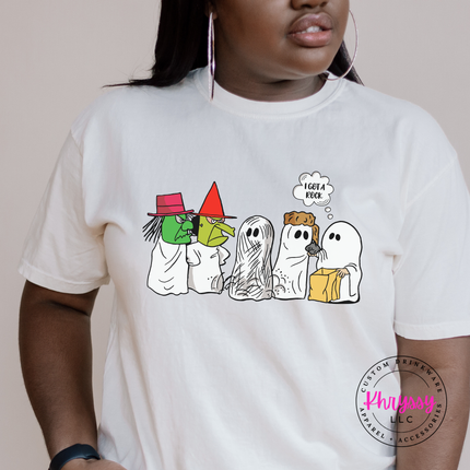 Ivory Comfort Colors tee styled with jeans, showing a retro Halloween ghost design.