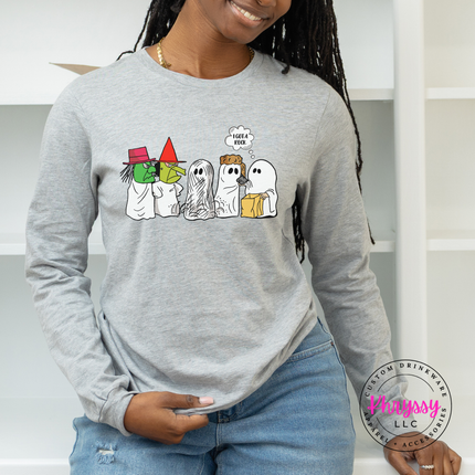Woman wearing an Ash Bella+Canvas long sleeve with a funny ghost Halloween graphic.