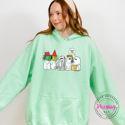 Mint hoodie featuring two retro ghosts trading Halloween candy bags.