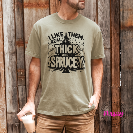 Woman wearing the Thick and Sprucey Christmas tee in Khaki.