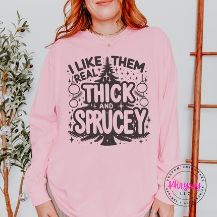 Blossom long sleeve tee with I Like Them Real Thick and Sprucey tree.