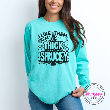 Funny Thick and Sprucey Christmas tree design printed on a Chalky Mint long sleeve tee.