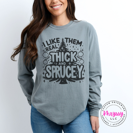 Woman wearing the Thick and Sprucey Christmas long sleeve tee in Gray.