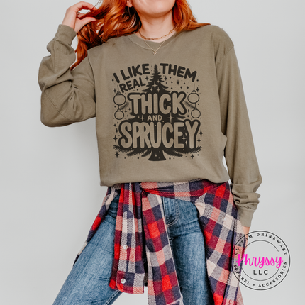 Funny Thick and Sprucey Christmas tree design printed on a Khaki long sleeve tee.
