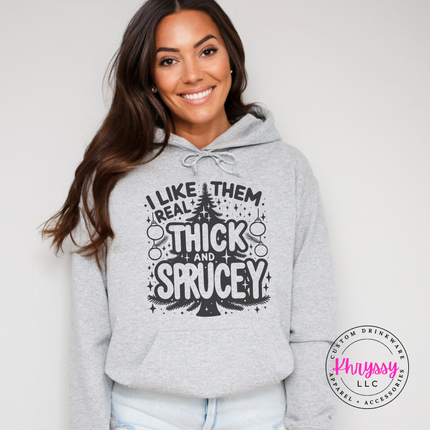 Ash hoodie with I Like Them Real Thick and Sprucey tree.