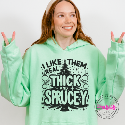 Mint Green hoodie with I Like Them Real Thick and Sprucey tree.