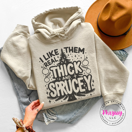 Sand hoodie featuring bubble lettering around a Christmas tree.