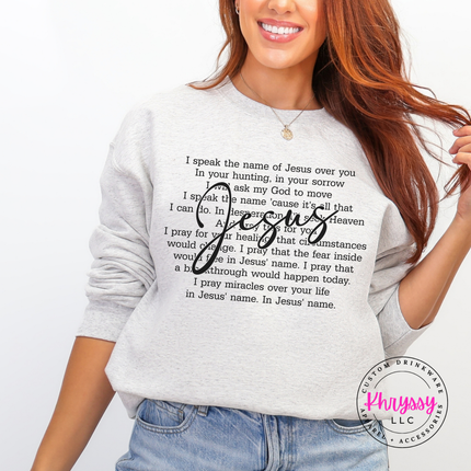 Ash Grey crewneck with a prayer design and a flowing Jesus script.