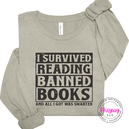 Heather Stone long sleeve featuring bold distressed I Survived Reading Banned Books typography.