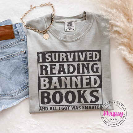 Granite soft cotton tee featuring the distressed banned books bold reader statement.