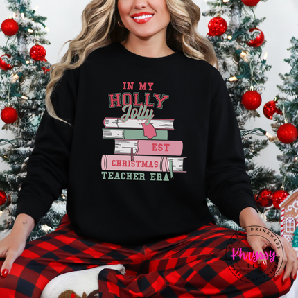 Black long sleeve tee with In My Holly Jolly Christmas Teacher Era books.