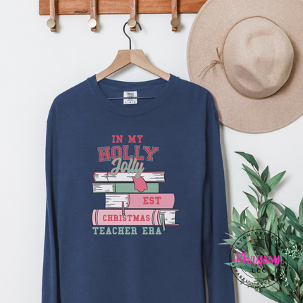 Holly Jolly teacher era long sleeve tee in Denim.