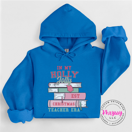 Antique Sapphire hoodie with In My Holly Jolly Christmas Teacher Era books.