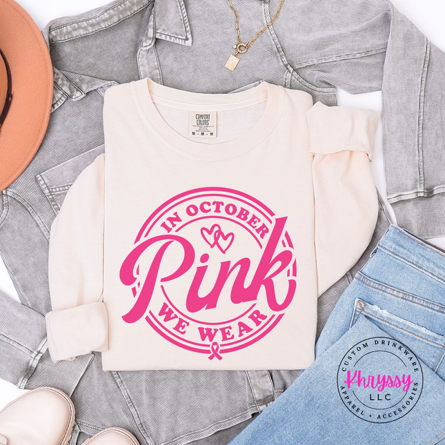Folded Ivory long sleeve tee with the in October we wear pink awareness design