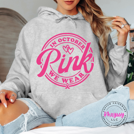 Ash hoodie in pink ink featuring the We Wear Pink badge design