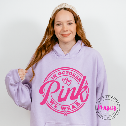 Orchid hoodie in pink ink shown front view with the We Wear Pink badge design