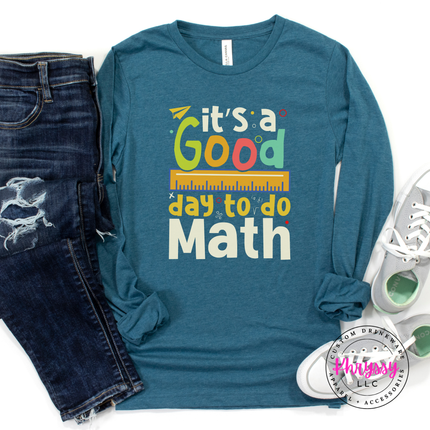 Heather Deep Teal long sleeve showing bright multicolor math teacher statement with ruler and letter detail.